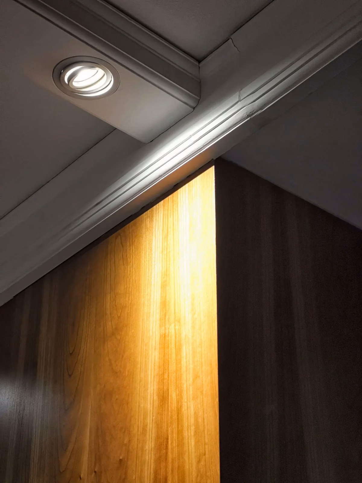 Architectural interior with recessed ceiling lighting