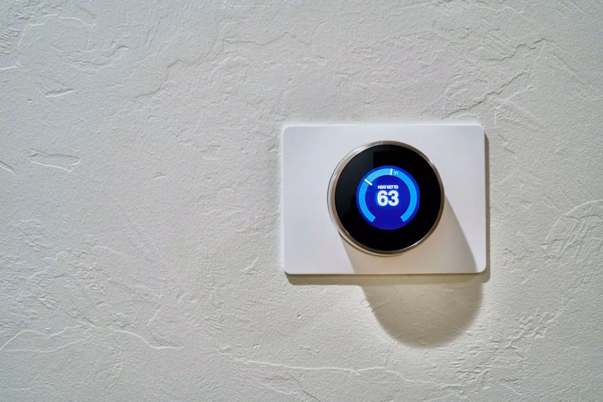 Wall-mounted smart thermostat and home controls