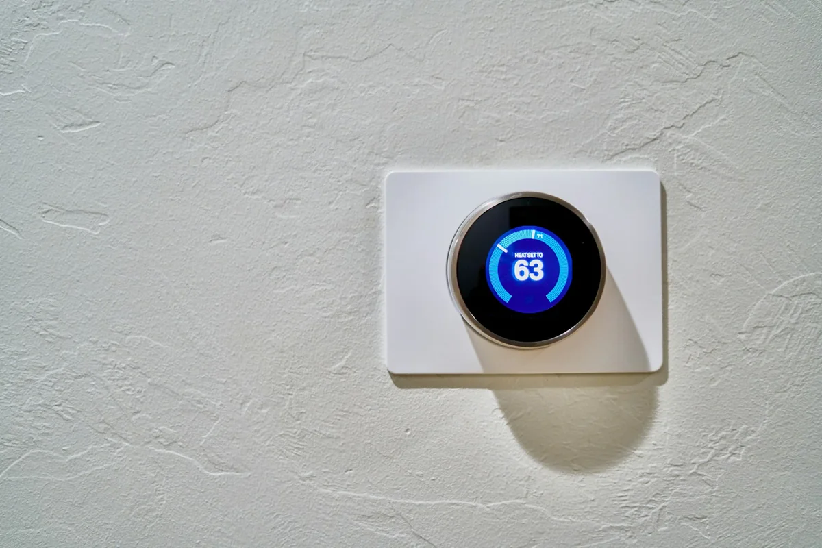 Wall-mounted smart thermostat and home controls